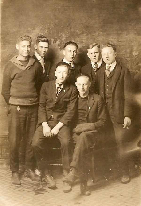 Nick Camodeca (left), others Unknown